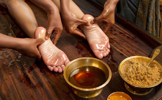 Pada abhyanga (foot massage)